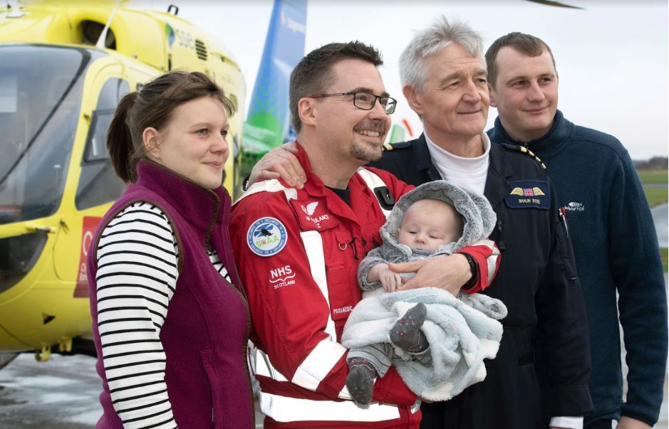 Baby injured in dog attack reunited with life-saving crew