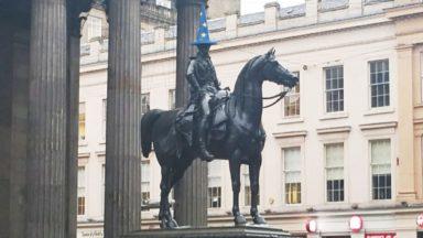 Duke of Wellington statue sports EU flag cone on Brexit day