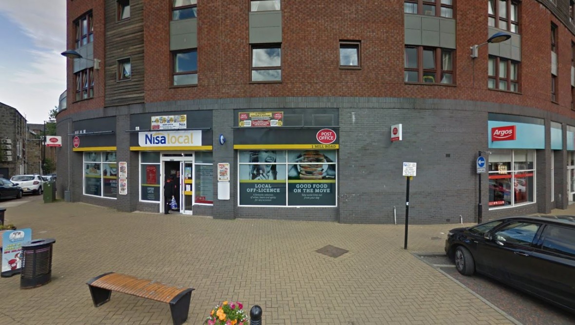 Robber sprayed worker in face with substance in shop raid