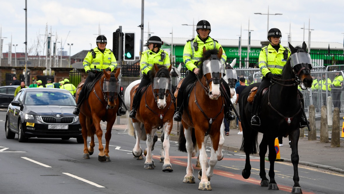 Celtic fan punched police horses during riot before game