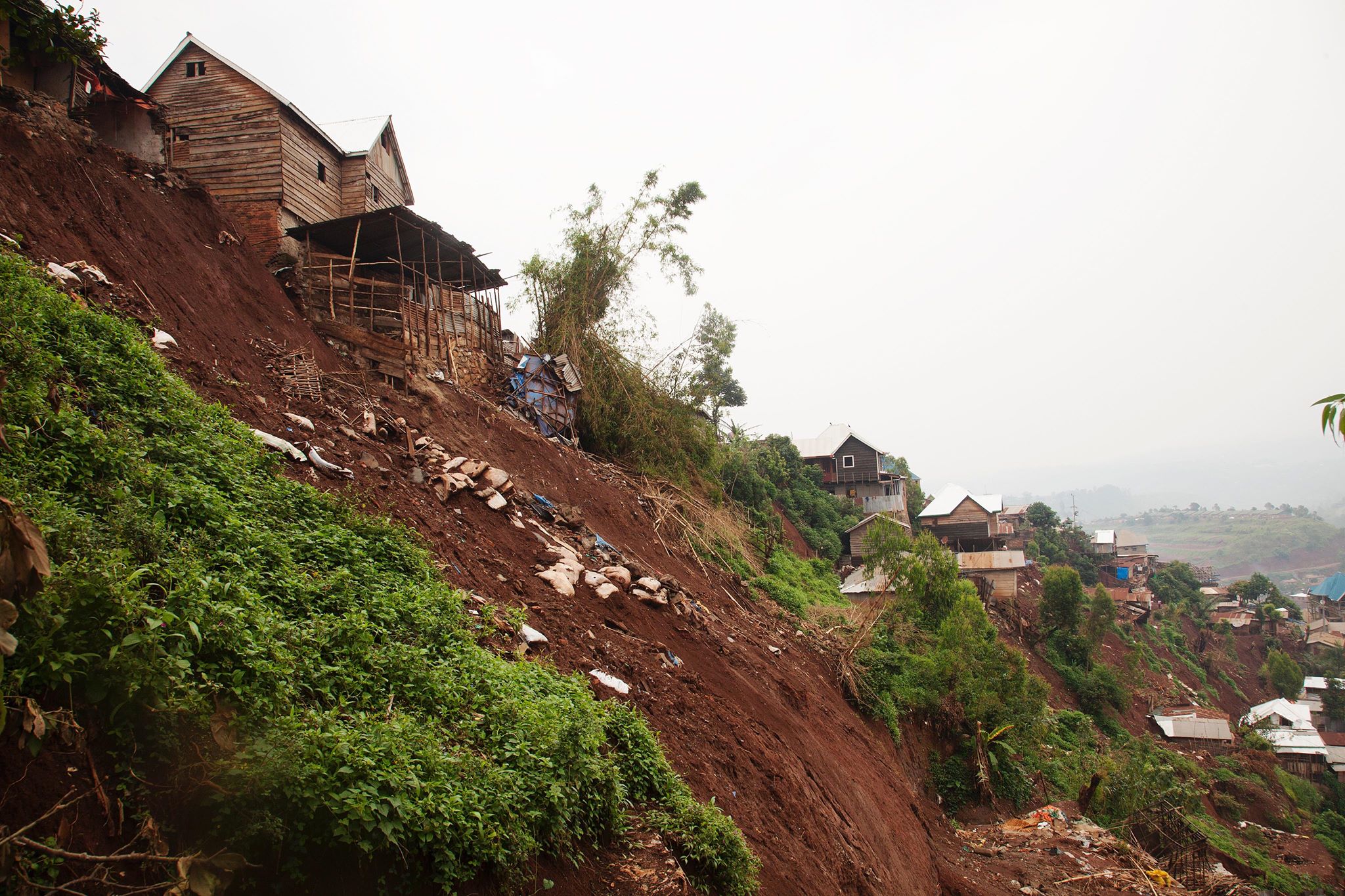  Devastation: A landslide killed a woman and five children.