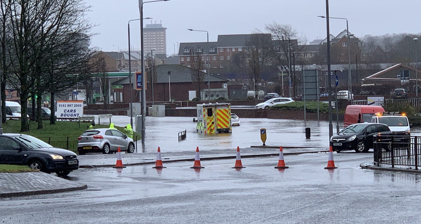 Ambulance trapped in floods in Paisley. 