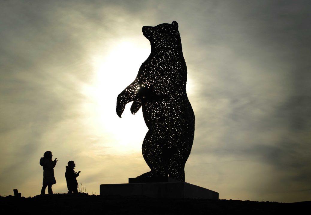 Schoolgirl wins competition to name giant bear sculpture
