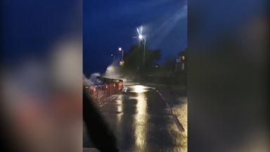 Drivers struggle with heavy floods as Storm Dennis hits