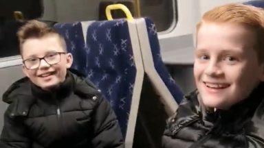 Schoolboys burst into rendition of Beatles classic on train
