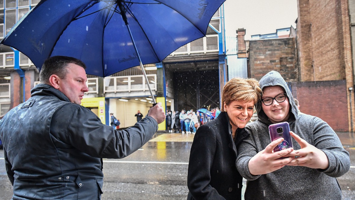 Nicola Sturgeon was out in the elements in Glasgow on Friday morning. Pic: Getty