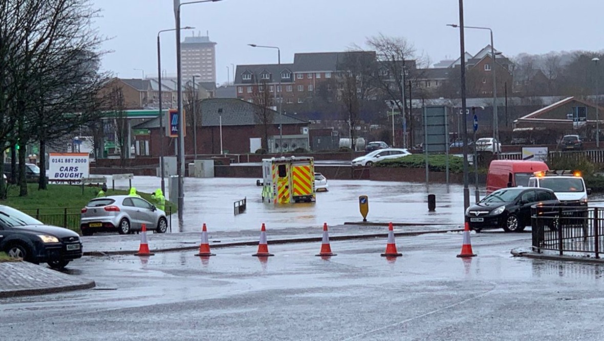 An ambulance trapped in floods in Paisley.