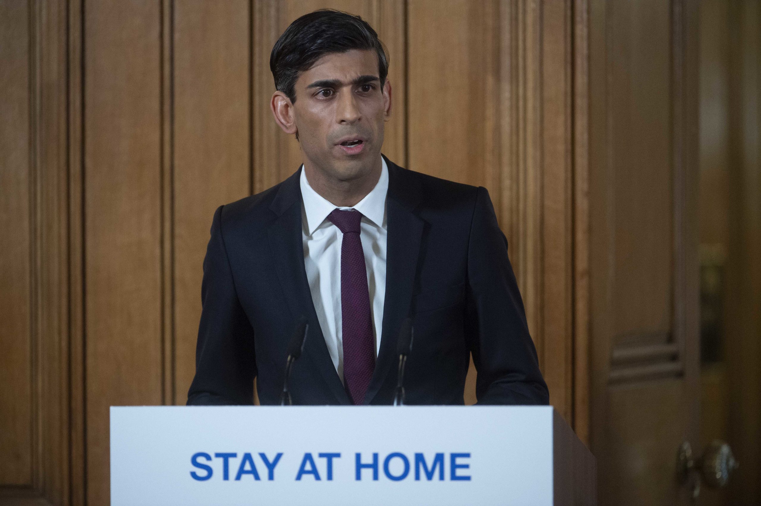 Chancellor Rishi Sunak speaks from the Downing Street podium on March 20. (Getty Images)