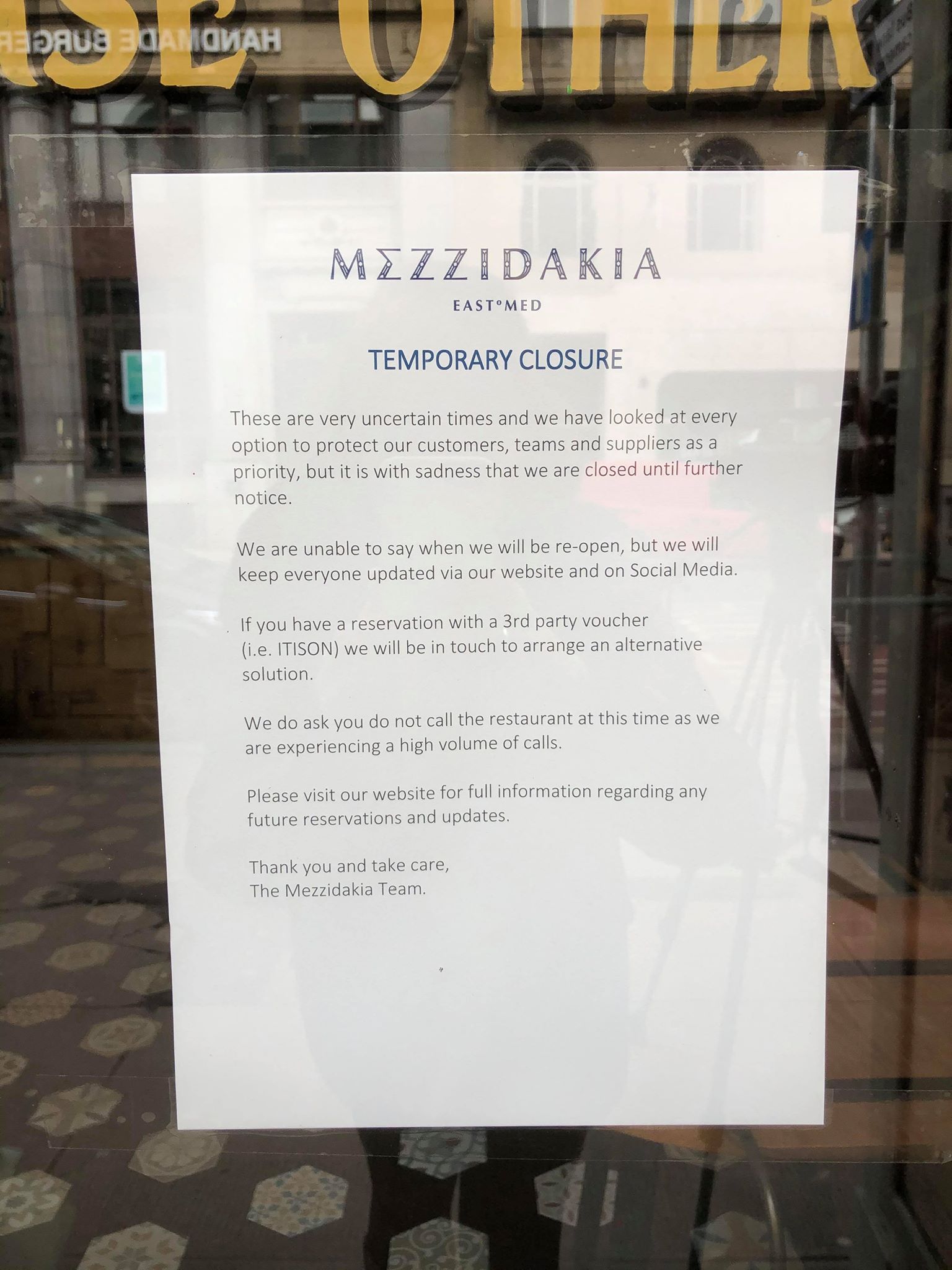 Closure signs could be seen on venue doors across the city.