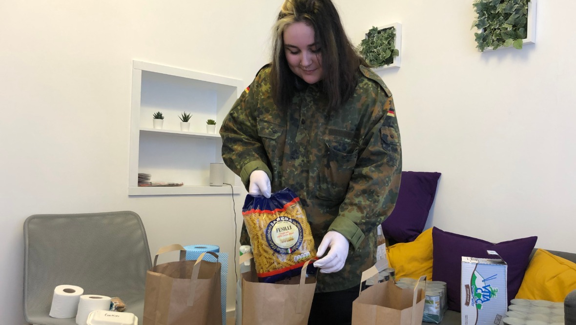 Rachael Lindsay: One of many volunteers making up food packs. 