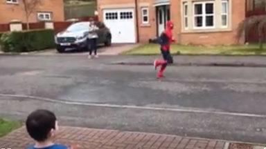 Dad pulls Spiderman stunt to raise money for son’s school
