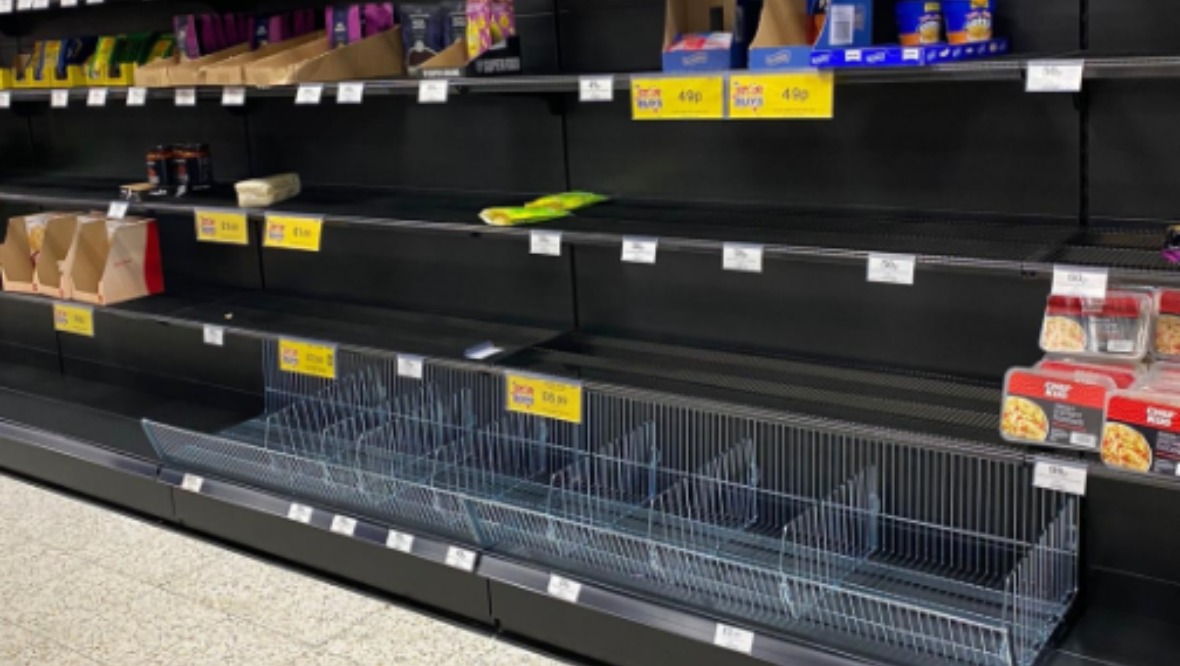 Stockpiling: Shelves in a Home Bargains in Glasgow.