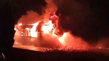 Bus bursts into flames as firefighters tackle blaze