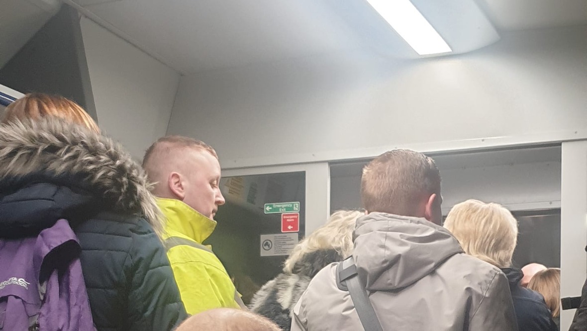 Overloaded: People could be seen standing on a service from Motherwell to Dalmuir. <strong>Kevin Hughes</strong>” /><span class=