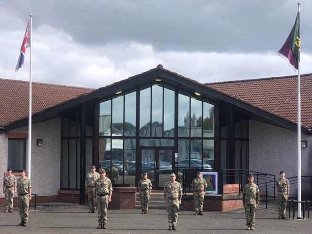 Members of the 51st infantry brigade in Scotland observe silence. (Twitter / @ArmyScotland)
