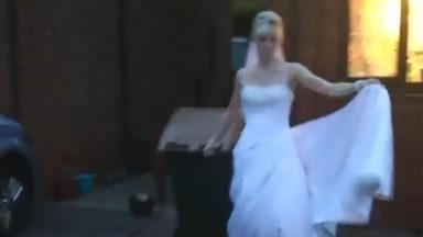 Woman takes bin out in wedding dress in lockdown challenge