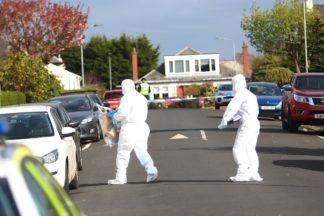 Murder probe launched after two found dead at house