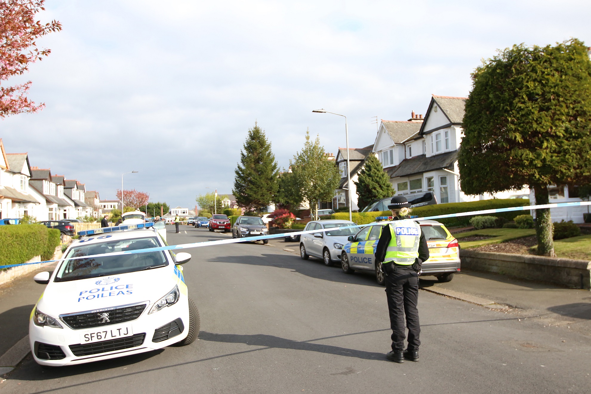 Murder probe launched after two found dead at house in Paisley.