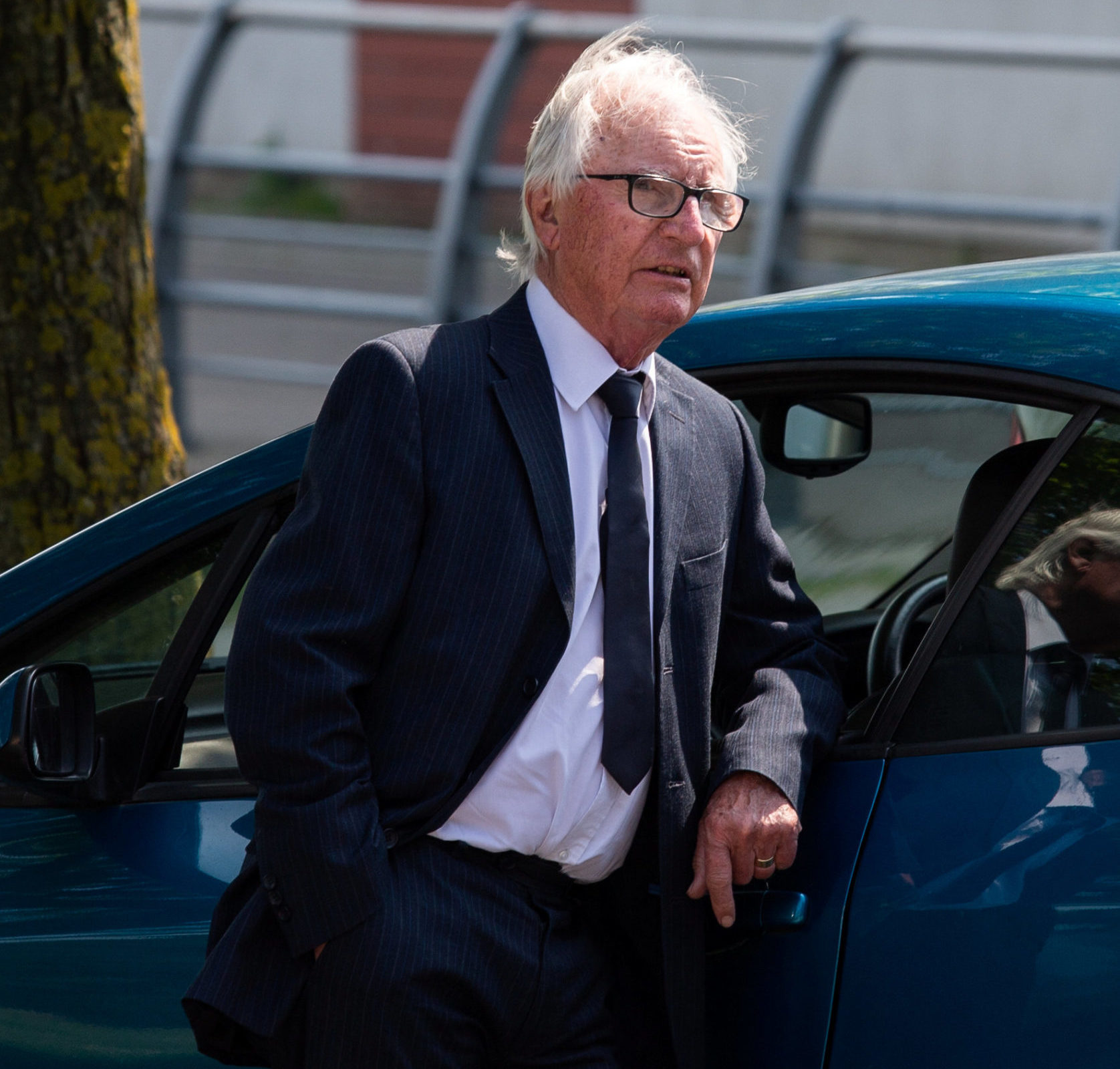 Syd Little during Eddie Large's funeral. SWNS.