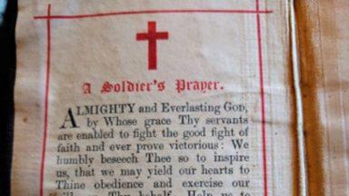 Appeal after old military bible found on promenade bench