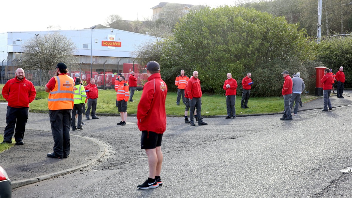 Postal staff walkout as bosses fail to clean ill worker’s desk