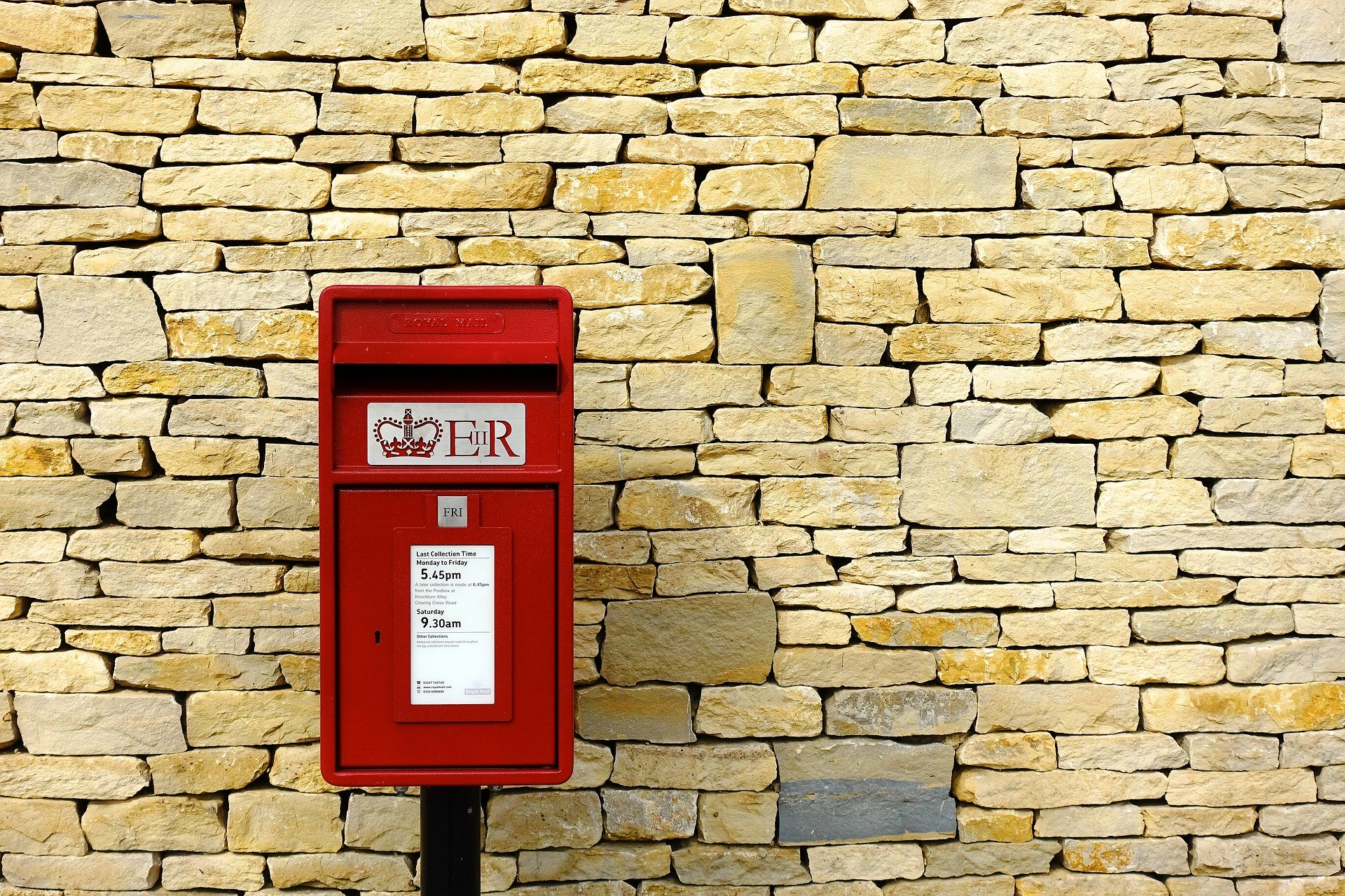 A Royal Mail post box bearing the EIIR insignia.