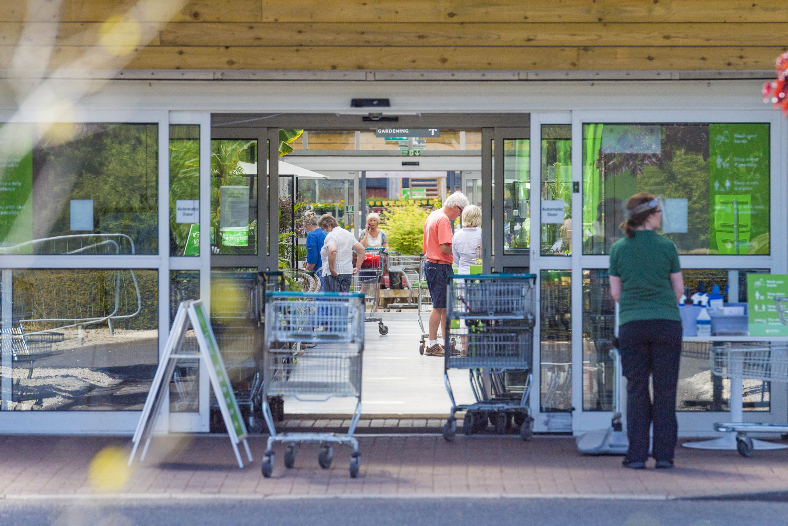 Shoppers browse summer range at the garden centre. SNS Group