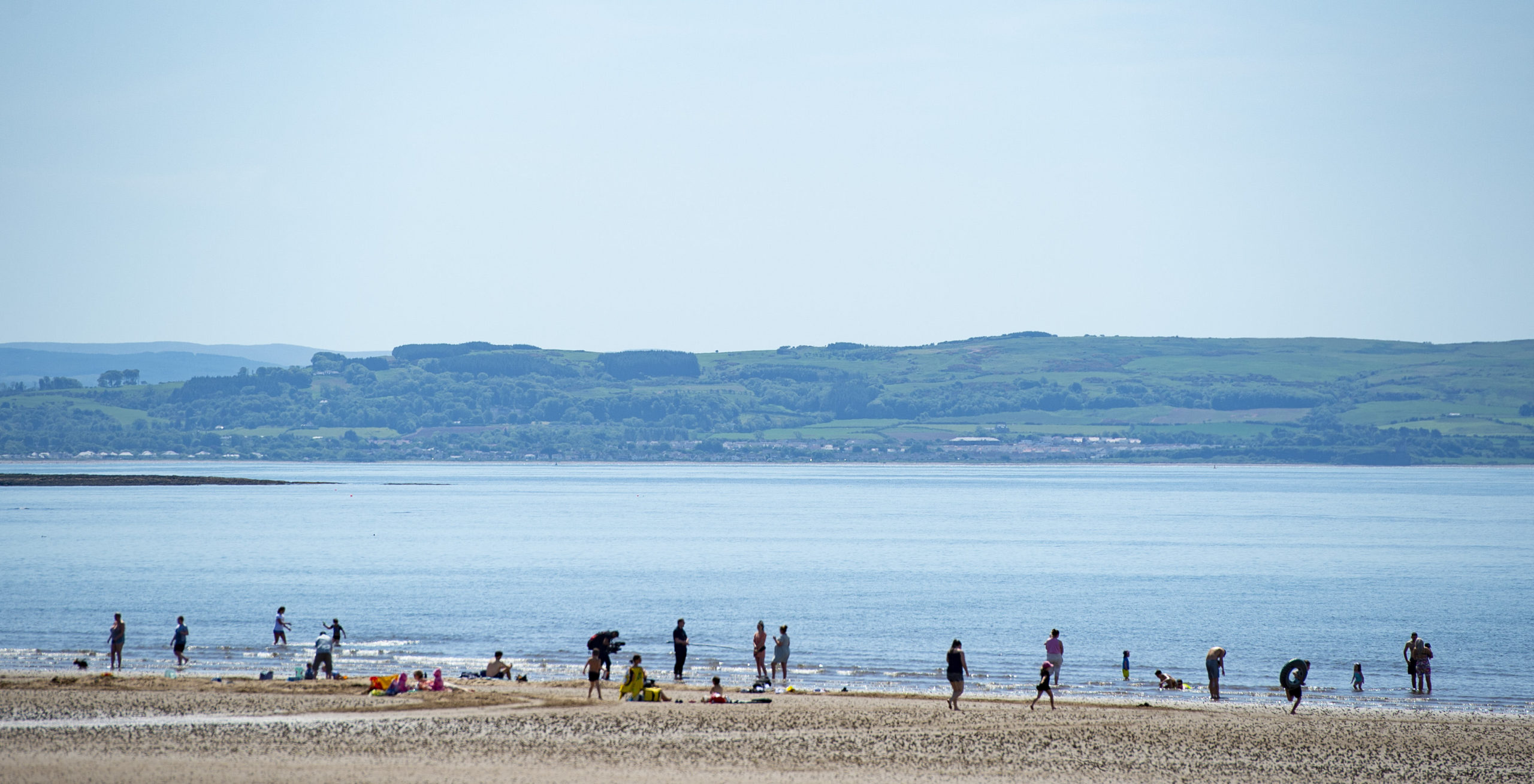 People descend on Troon Beach as lockdown measures begin to ease. SNS Group.