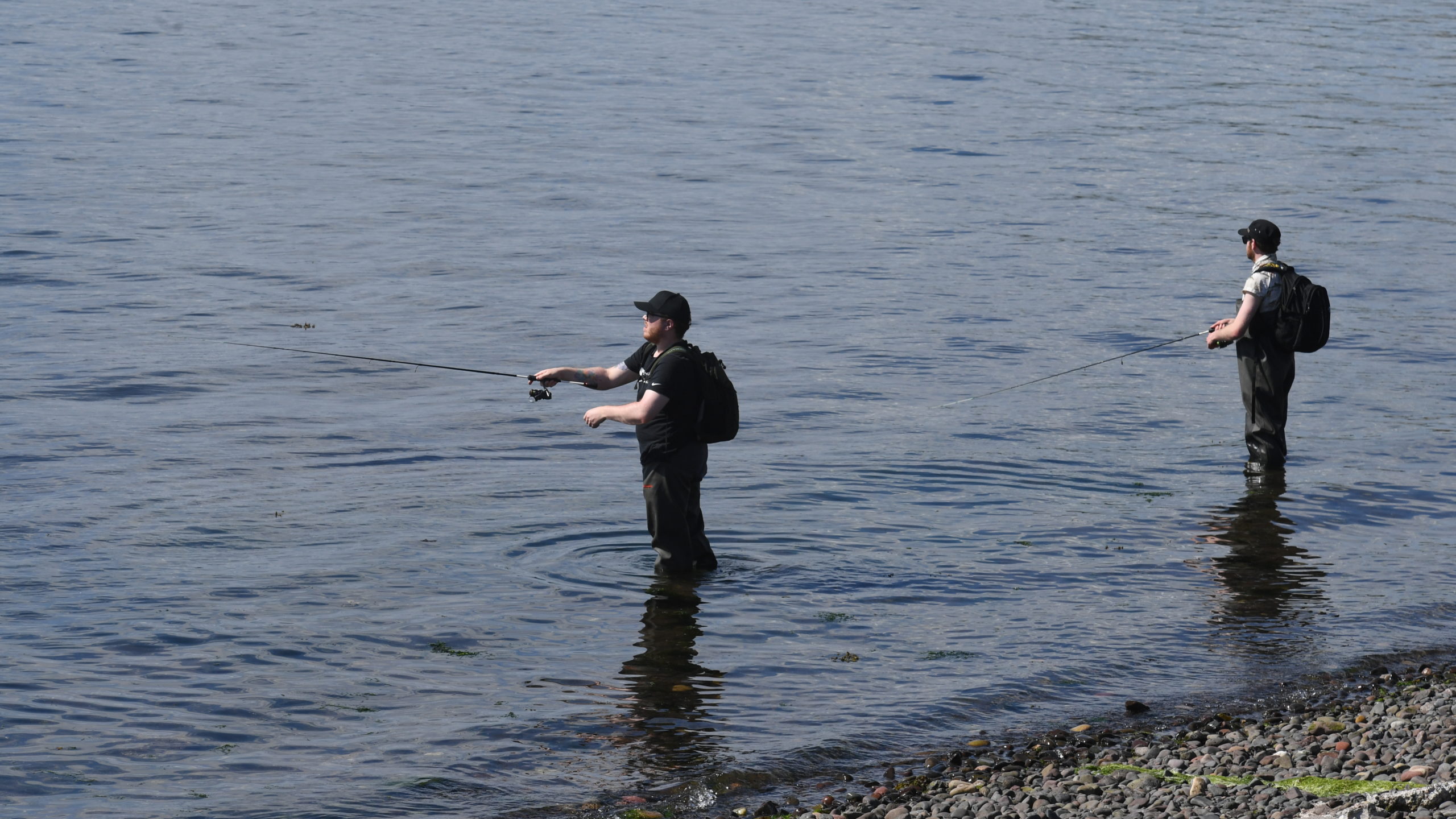 Gone fishing: These fisherman enjoyed casting off on the Largs waterfront.