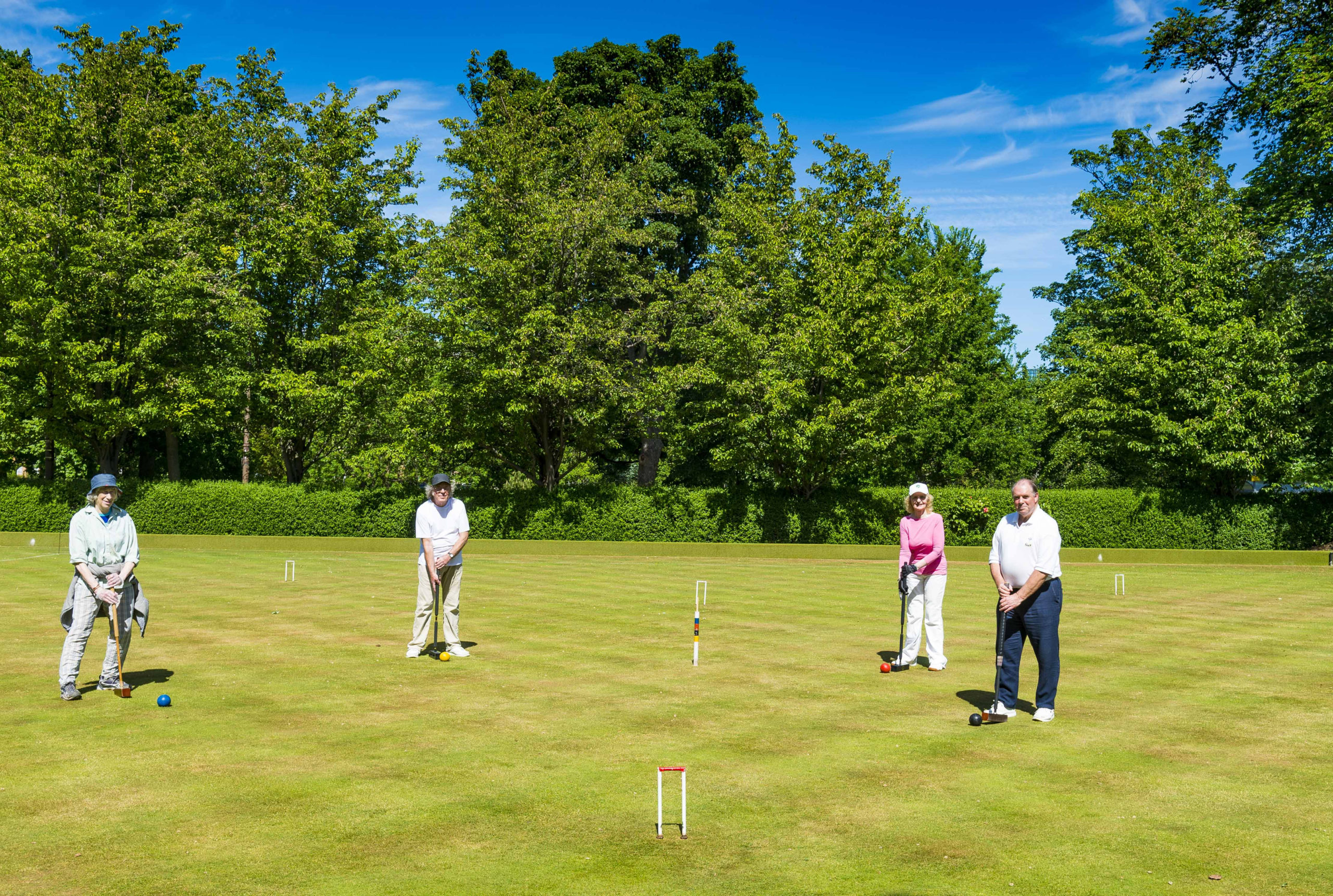 Game on: Members of Meadows Croquet Club got out on the green.