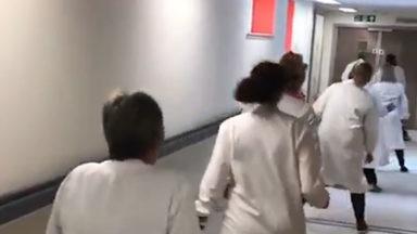 Lab workers experiment line-dancing skills in hospital