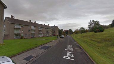 Man arrested after body of woman discovered in flat