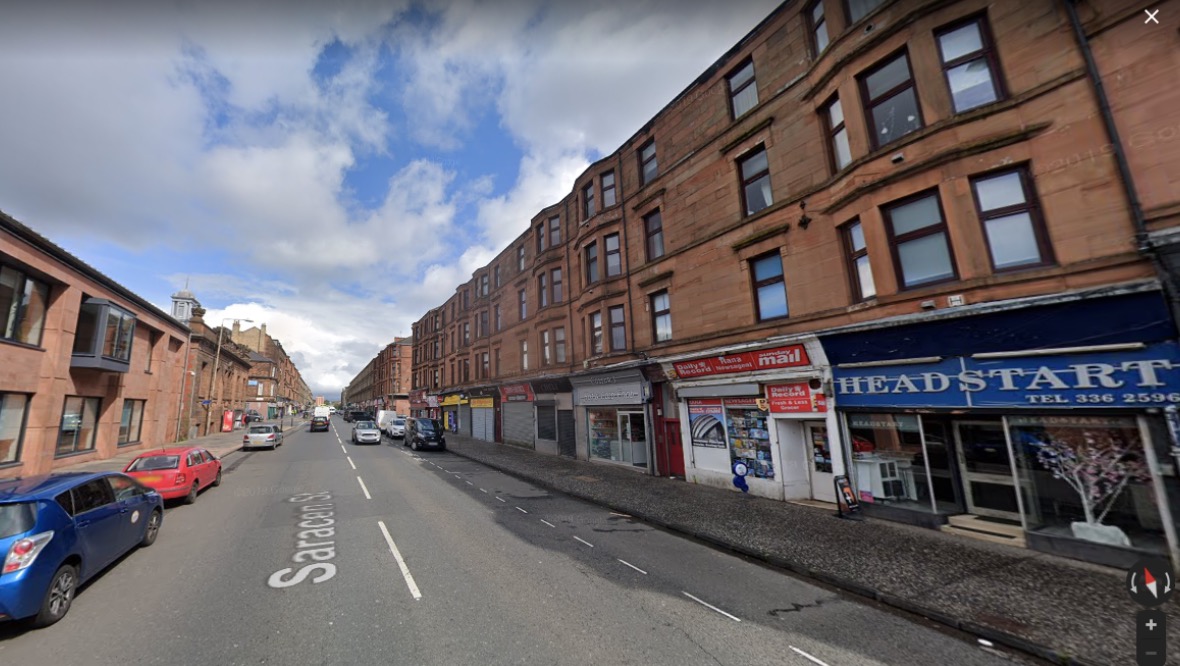 Woman seriously injured after falling from tenement flat