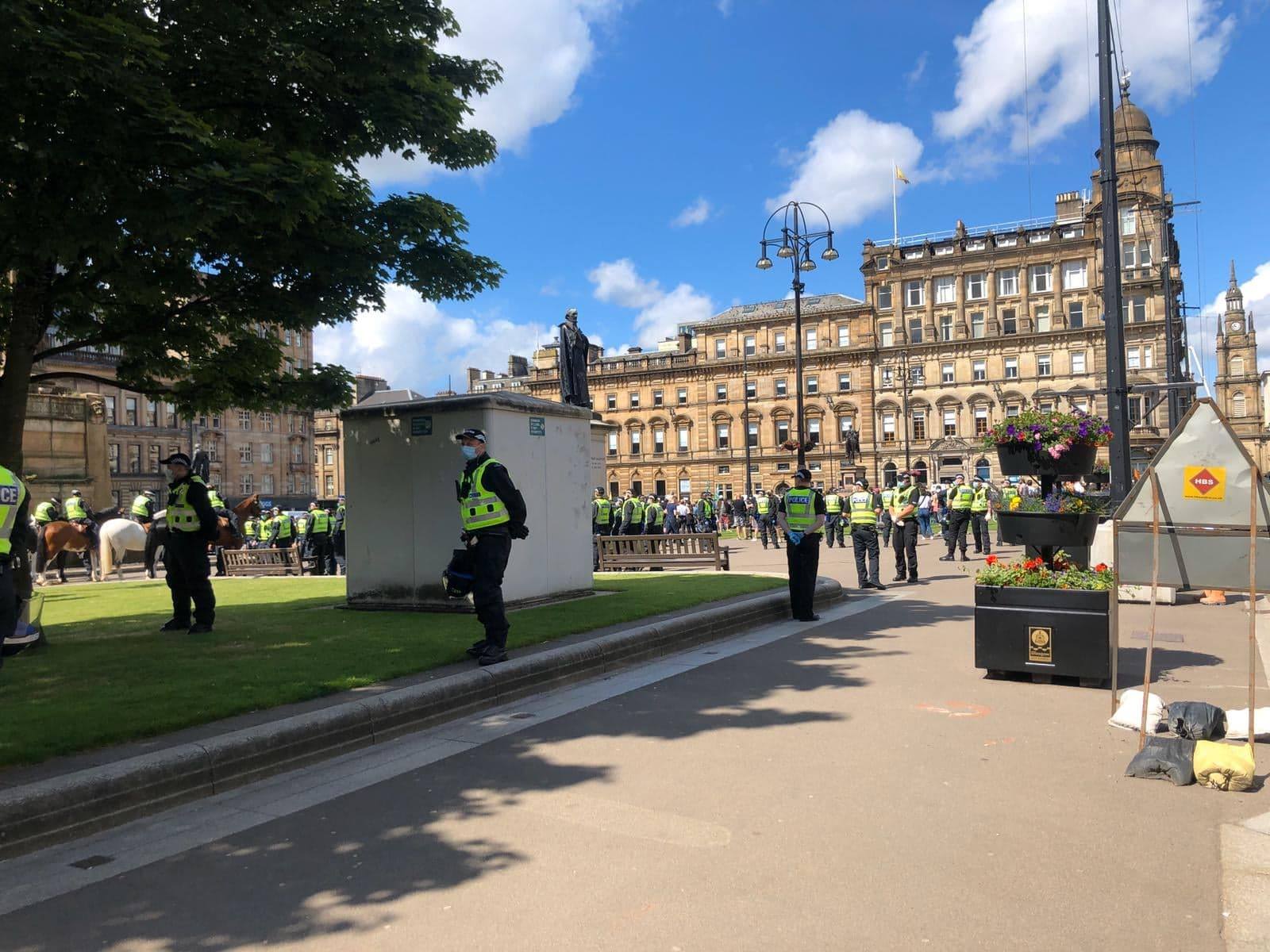 Police vans lined the square with more than 100 officers in attendance.