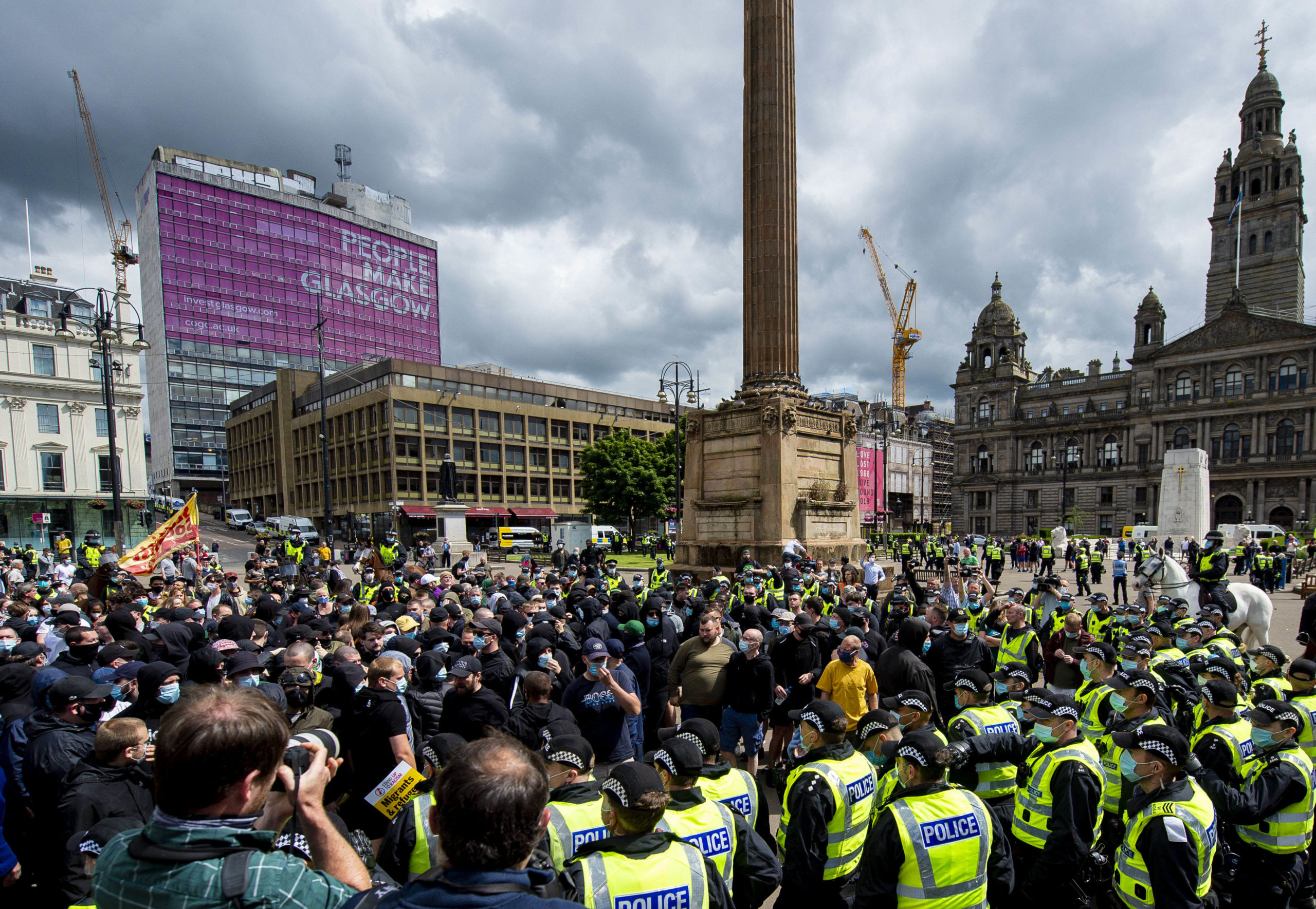 Large police presence surrounding activists. SNS Group.