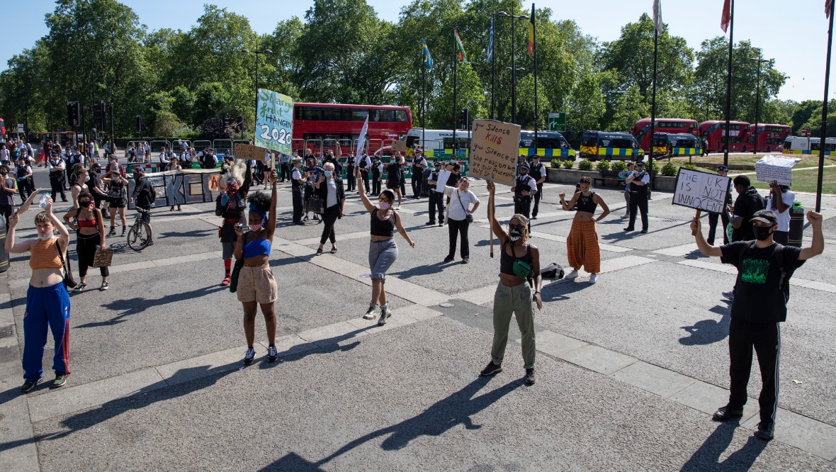 Black Lives Matter Protesters socially distance from each other in London.<br><strong>Image credit</strong>: Getty”/><span
class=