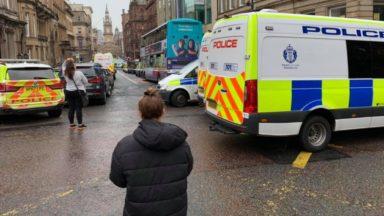 Armed police on scene as major incident closes Glasgow roads