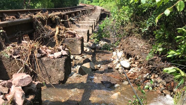 Damage: The line was closed following a flash-flood in June.