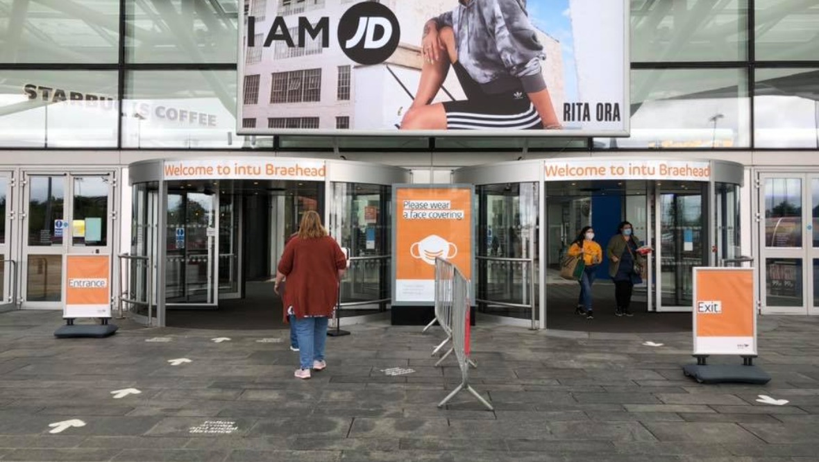 Shoppers queue outside Braehead in Glasgow.