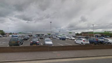 Probe launched after Audi ploughs through Asda car park wall