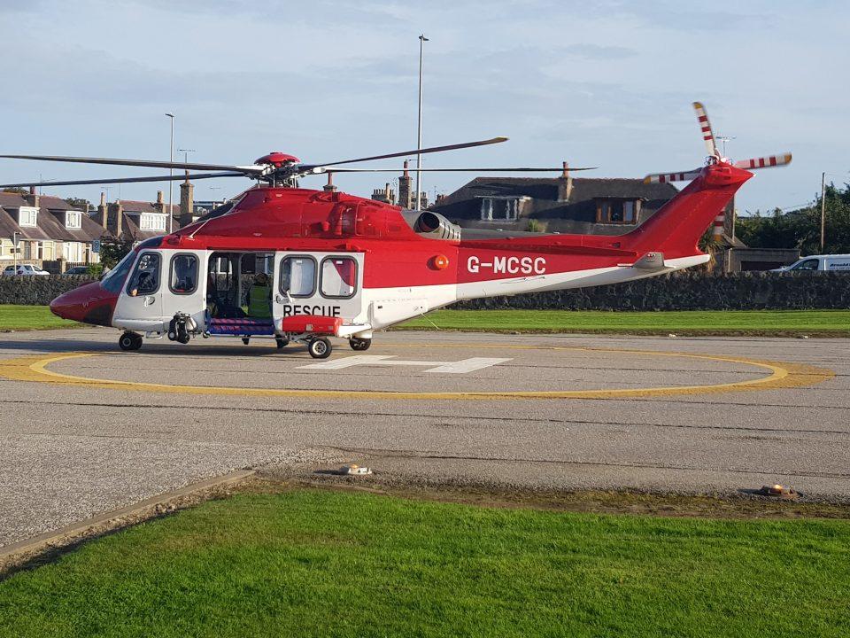 Man airlifted to hospital after trying to rescue stranded dog