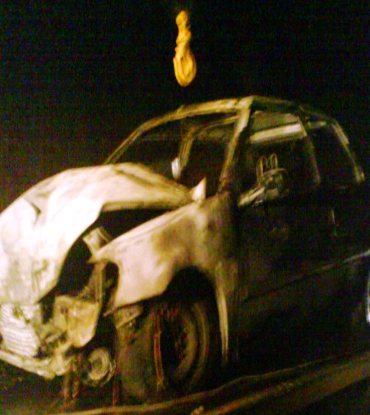 Blaze: Gale Coates' son's car after being engulfed in flames.