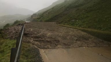 Torrential rain causes delays and a 60-mile diversion