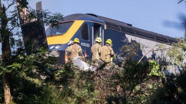Families anxiously await news after Aberdeenshire train derailment