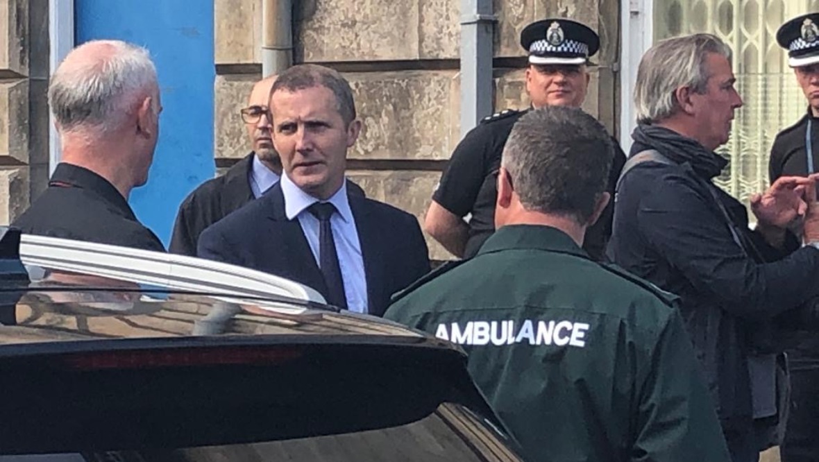 Michael Matheson meets emergency workers in Stonehaven. Picture: STV
