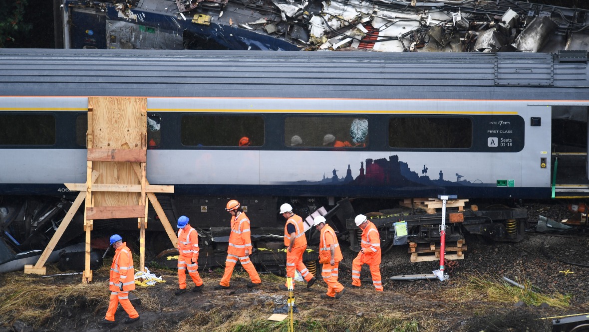 Investigators at the site of the crash on Friday. Pic: Getty Images.