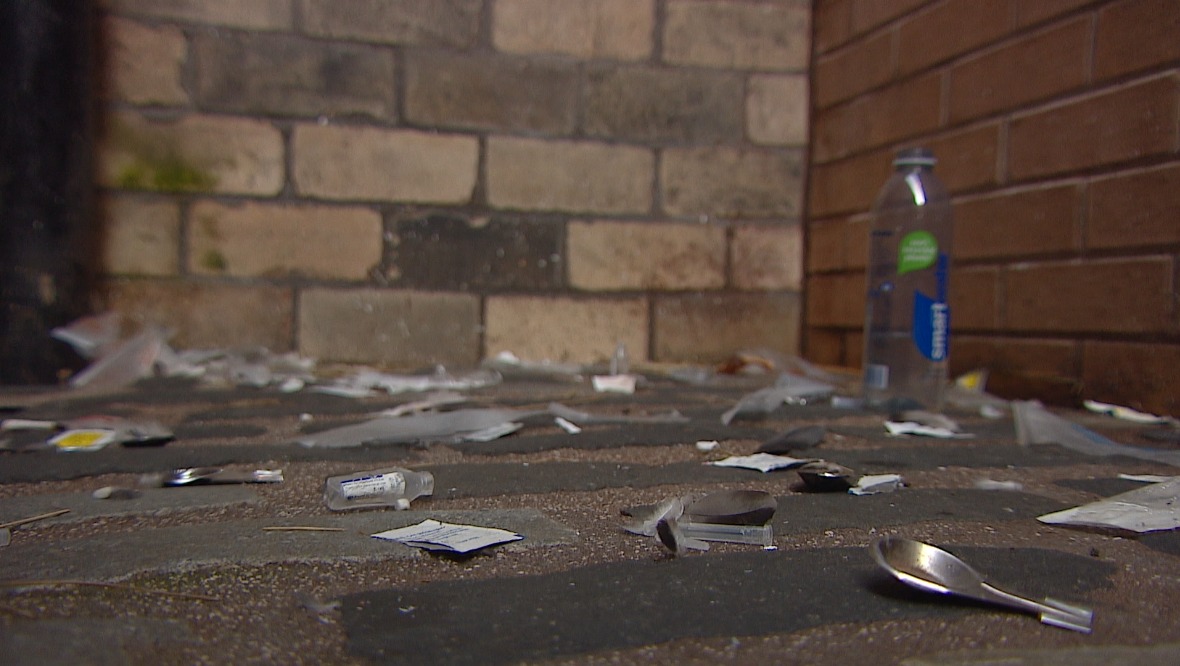 Glasgow: An alleyway is littered with drug paraphernalia. 