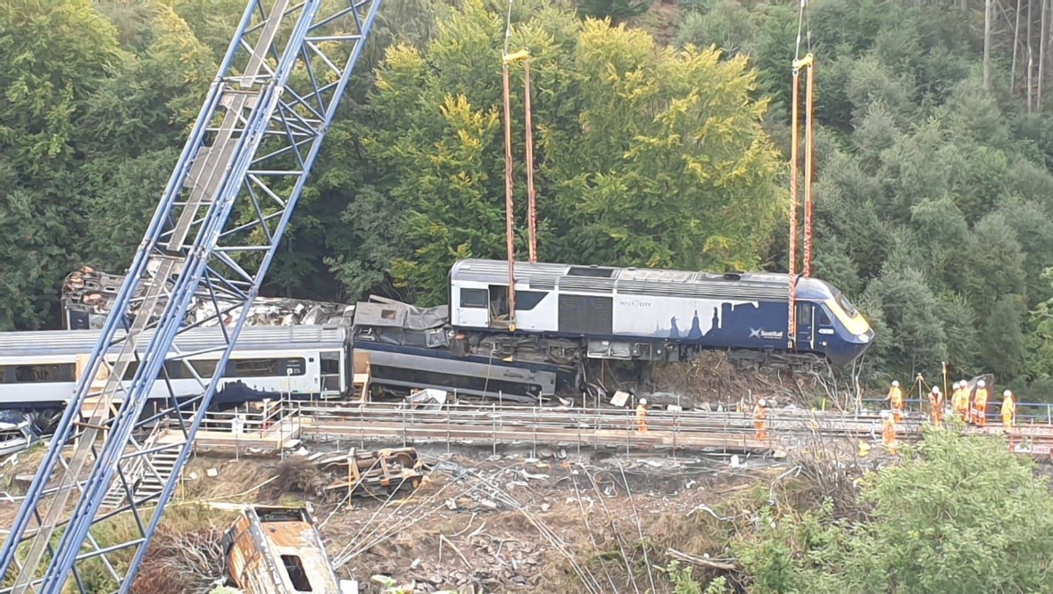 Last of derailed train carriages lifted from track