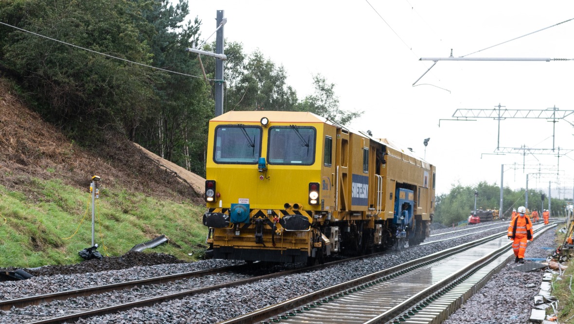 Repair: Engineers have been working round-the-clock. <strong>NETWORK RAIL</strong>” /><cite class=