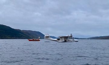 Seaplane stranded on Loch Ness rescued by lifeboat
